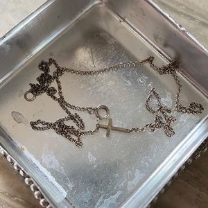 Dogeared sideways silver cross necklace